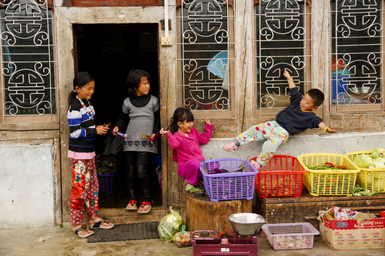 Oops! Kids at their home with a store front, Haa Valley, Bhutan